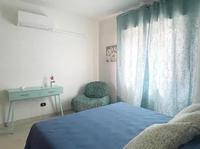 Letto o letti in una camera di Cocteau House