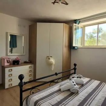 Letto o letti in una camera di Pitty House Sardegna