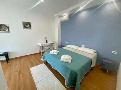 Letto o letti in una camera di Zulie Rooms