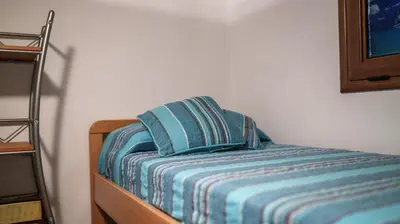 Letto o letti in una camera di Welcomely - Petali di Rosa - A Due Passi dalla Spiaggia