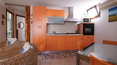 Cucina o angolo cottura di Welcomely - Petali di Rosa - A Due Passi dalla Spiaggia