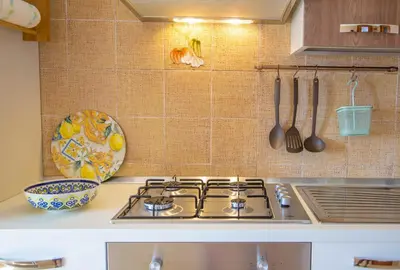 Cucina o angolo cottura di Casa Leo Lungomare Palmasera