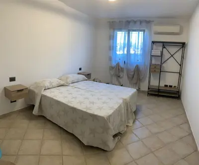 Letto o letti in una camera di Fema House Solità
