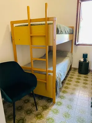 Letto o letti in una camera di Il Sussurro del mare