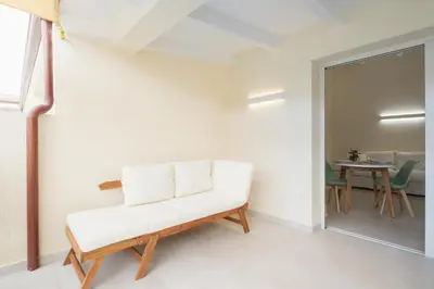 Area soggiorno di Luxury House & Spa in Baia Turchese con idromassaggio privato