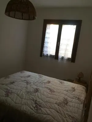 Letto o letti in una camera di Appartamento Ampio e Comodo