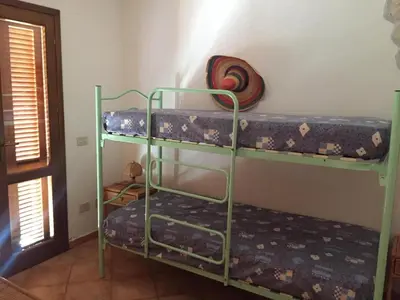 Letto o letti in una camera di Appartamento Stile Gallurese