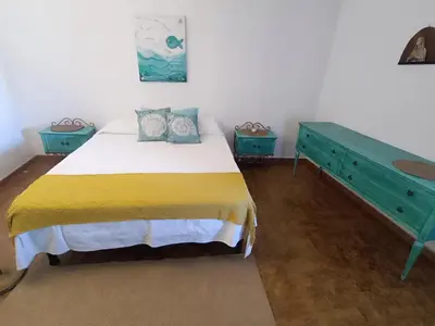Letto o letti in una camera di Orosei Re - Rosa's House Centro Storico