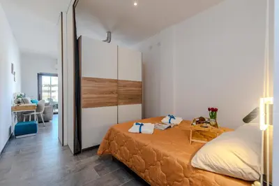 Letto o letti in una camera di Always Traveling Near The City Center - Happy Rentals