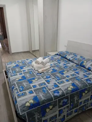 Letto o letti in una camera di Casa vacanza Fabrizio San Teodoro