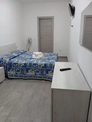 Letto o letti in una camera di Casa vacanza Fabrizio San Teodoro