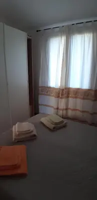 Letto o letti in una camera di Raggio di sole - olbia