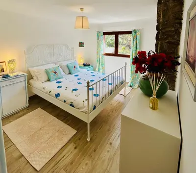 Letto o letti in una camera di La Casetta di Irene