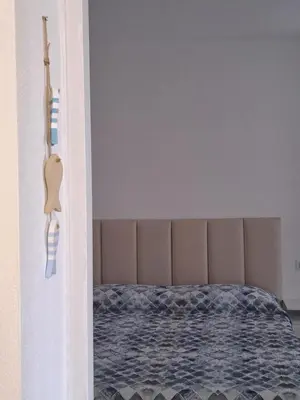 Letto o letti in una camera di Orosei Apart
