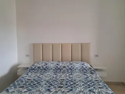 Letto o letti in una camera di Orosei Apart