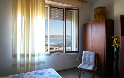 Letto o letti in una camera di Casa Cartolina Santa Lucia
