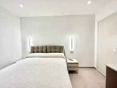 Letto o letti in una camera di Villa Berenike