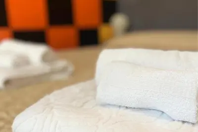 Letto o letti in una camera di Vicino Aeroporto - Orange Marina Room