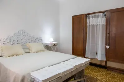 Letto o letti in una camera di Casa Babylon, Bohemian Getaway