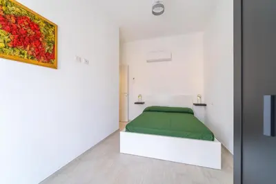 Letto o letti in una camera di Linfa Guest House - Olbia centro