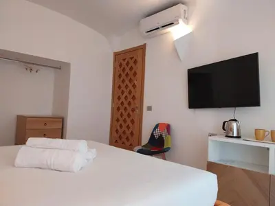 Letto o letti in una camera di Vittoria Home