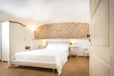 Letto o letti in una camera di Domo Incantos
