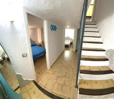 Letto o letti in una camera di Villa Franziscu