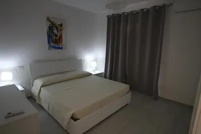 Letto o letti in una camera di Appartamento Valkiria