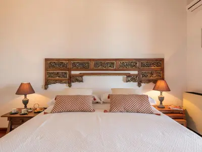 Letto o letti in una camera di Villa Billia Sardinia Domus