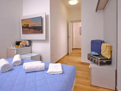 Letto o letti in una camera di GP34 Affittacamere