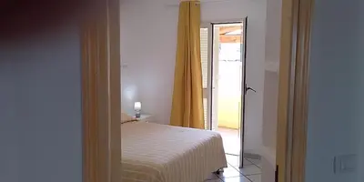 Letto o letti in una camera di Casa Marconi