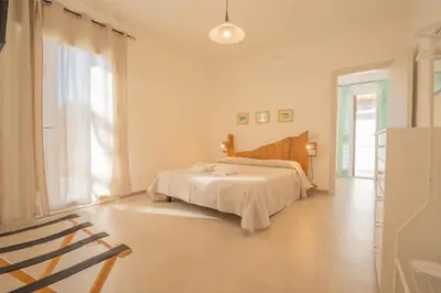 Letto o letti in una camera di Domus Lucia 1