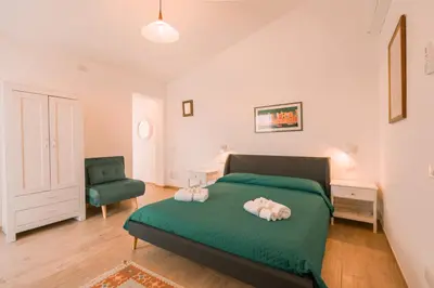 Letto o letti in una camera di Domus Lucia 1
