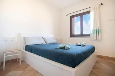 Letto o letti in una camera di Casina Maria