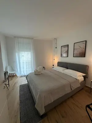 Letto o letti in una camera di San Simplicio Relax Apartment