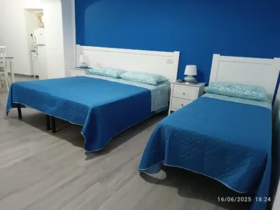 Letto o letti in una camera di Casa Iole
