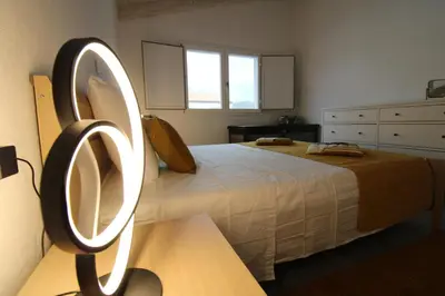 Letto o letti in una camera di arena's casa vacanze