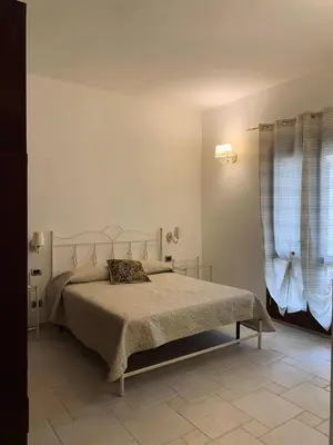 Letto o letti in una camera di Dei lidi's house