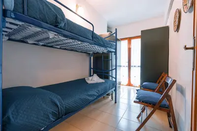 Letto o letti in una camera di Beach Villa in San Giovanni
