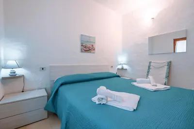 Letto o letti in una camera di Beach Villa in San Giovanni