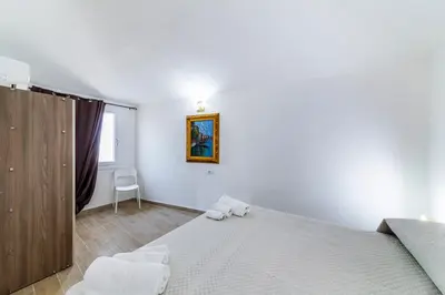 Letto o letti in una camera di LeaRooms