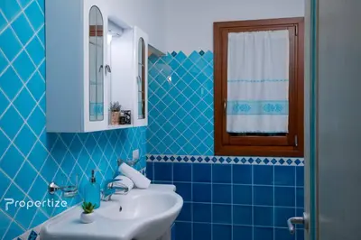 Bagno di Villa Azzurra by Propertize