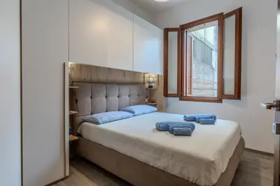 Letto o letti in una camera di Perseo case vacanze Mameli Apartment