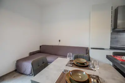 Area soggiorno di Perseo case vacanze Mameli Apartment