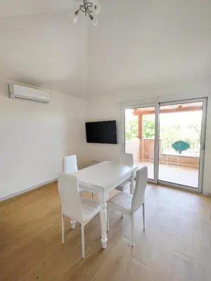 TV o dispositivi per l'intrattenimento presso Olbia Mare Luxury Apartment