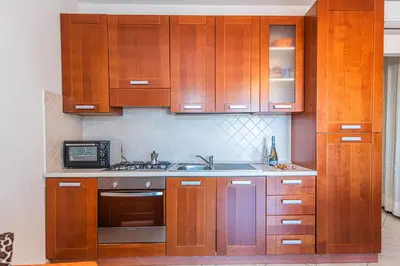 Cucina o angolo cottura di La Casa di Paola - Happy Rentals