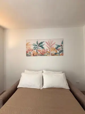 Letto o letti in una camera di Luce di Mare - Cuore di Olbia