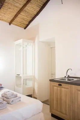 Letto o letti in una camera di Domo Bangone - Sa Corte