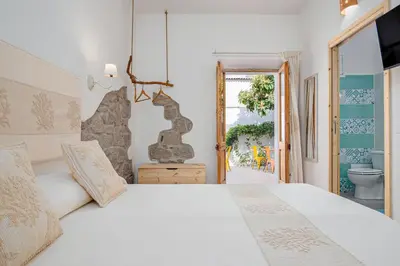 Letto o letti in una camera di Nott'e Die