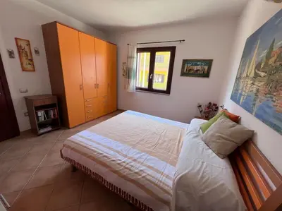 Letto o letti in una camera di Lovely Apartment with terrace and Air Conditioning
